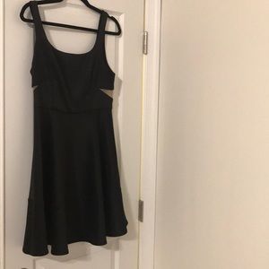 Black dress with gold zipper.